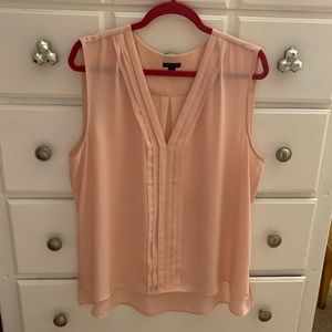 Light pink sleeveless blouse